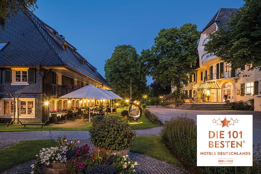 Parkhotel Adler with  the Black Forest House and the Belle-Époque main building by night